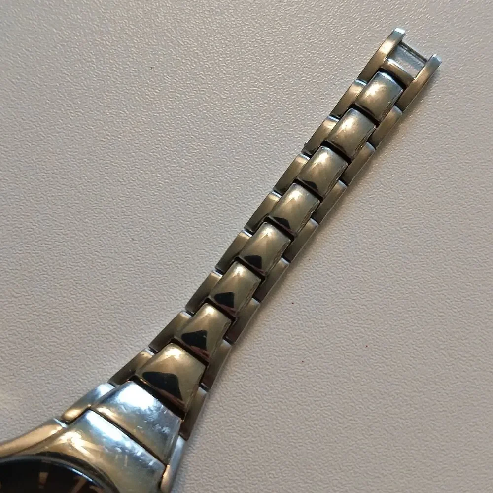 Kenneth Cole New York KC4381 Stainless Steel Women Watch Gray Textured Dial 31mm